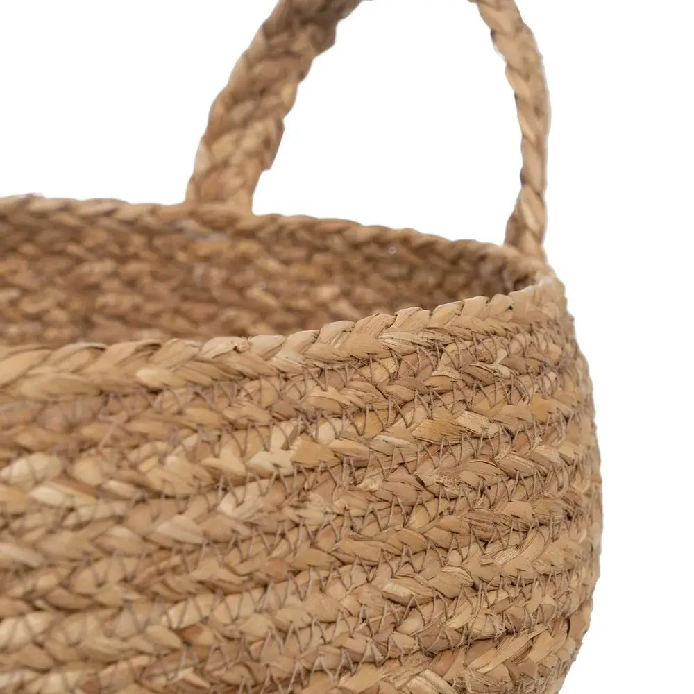Natural fiber basket from SKAY, showcasing a woven design and earthy tones, perfect for storage or decor.