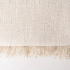 Beige cushion by SKAY, featuring a soft texture and minimalist design, perfect for home decor and comfort.