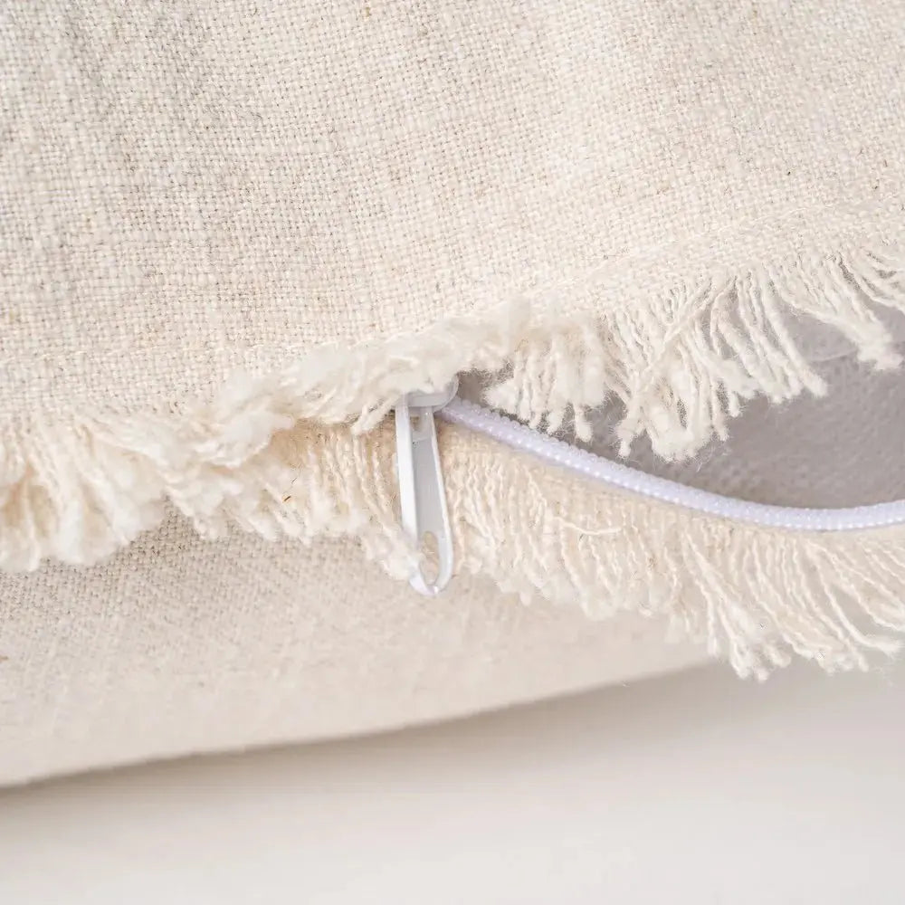 Beige cushion from Skay, featuring a soft fabric and minimalist design, ideal for home decor and comfort.