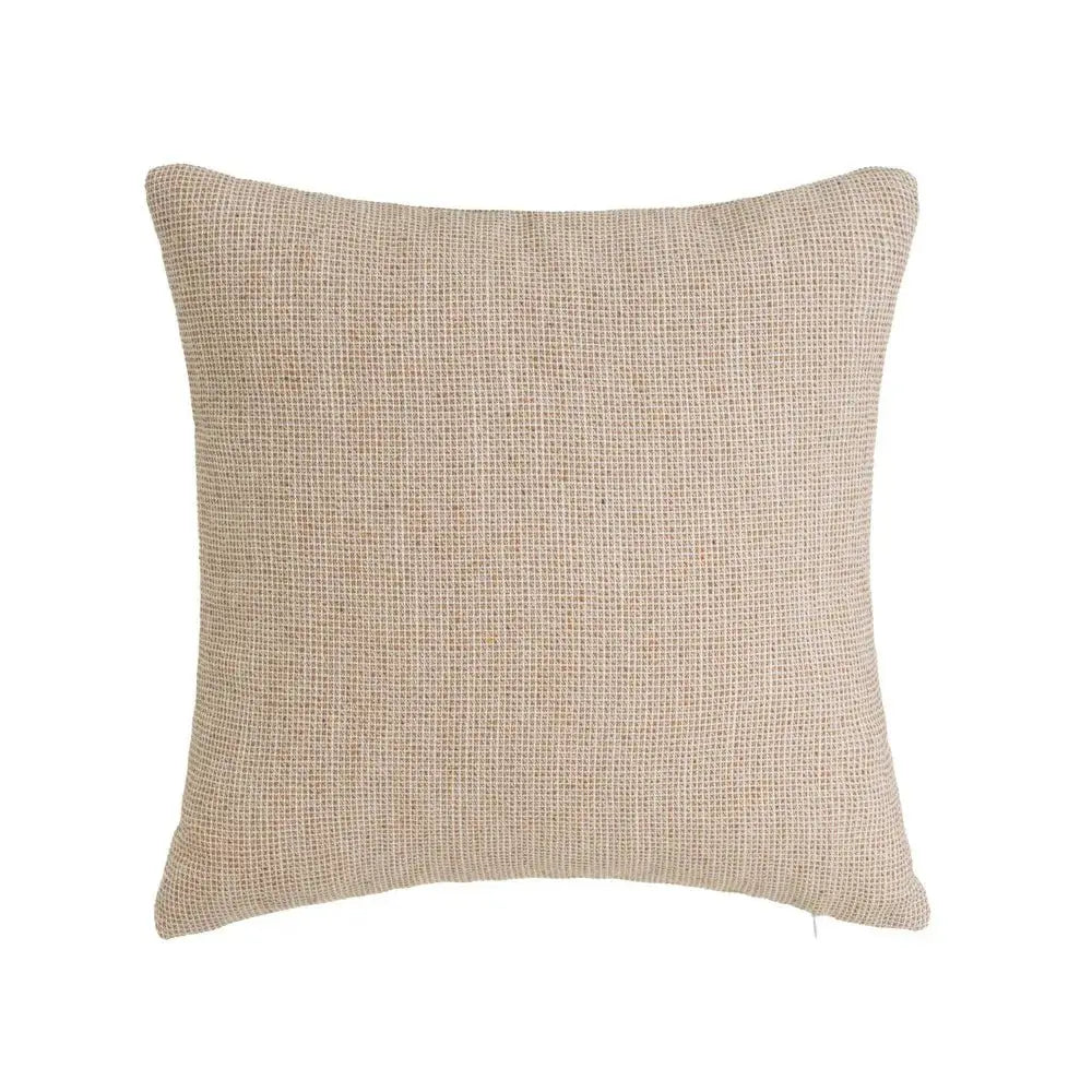 Soft SKAY faux cushion in a cozy setting, showcasing its plush texture and modern design.