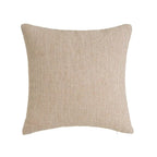 Soft SKAY faux cushion in a cozy setting, showcasing its plush texture and modern design.