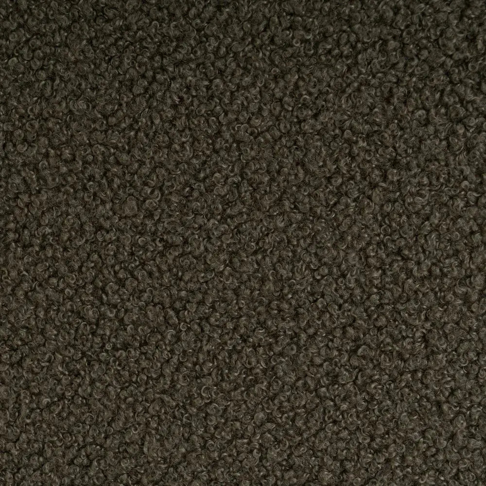 Cozy SKAY Sherpa Bouclé cushion with soft texture and neutral color, perfect for home decor and comfort.