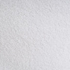 Cozy SKAY Sherpa Boucle cushion with a textured fabric and soft, plush design, perfect for adding comfort to any space.