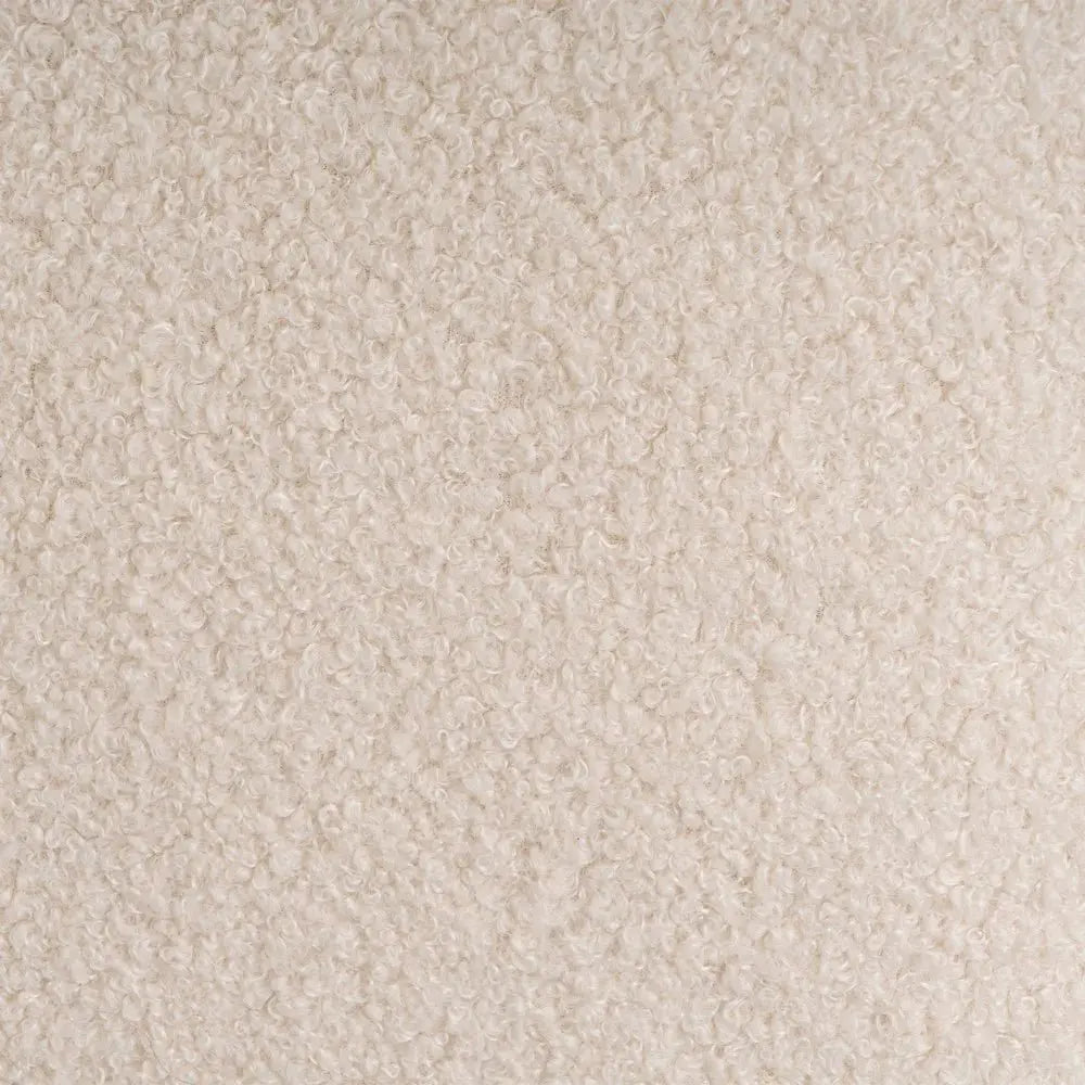 Soft SKAY sherpa bouclé cushion in a cozy, textured design, ideal for adding comfort to any living space.