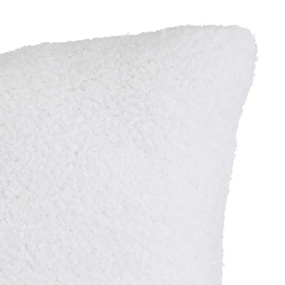 Soft SKAY Sherpa Bouclé cushion in a cozy cream color, featuring a textured fabric for added comfort and style.
