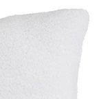 Soft SKAY Sherpa Bouclé cushion in a cozy cream color, featuring a textured fabric for added comfort and style.