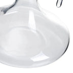 SKAY glass wine decanter showcasing a sleek, modern design with a curved spout and elegant silhouette.
