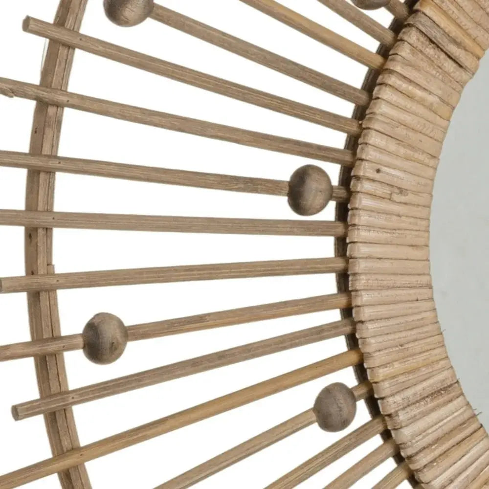 Natural bamboo mirror by SKAY featuring a round design with a textured frame, perfect for home decor.