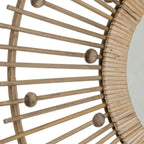 Natural bamboo mirror by SKAY featuring a round design with a textured frame, perfect for home decor.