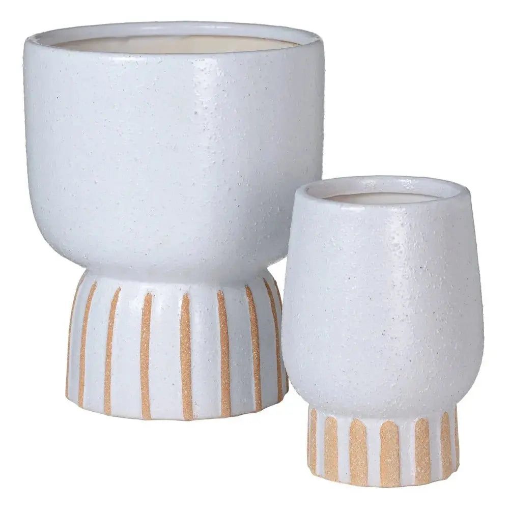 White ceramic vase by SKAY, featuring a smooth surface and elegant design, perfect for floral arrangements or decor.