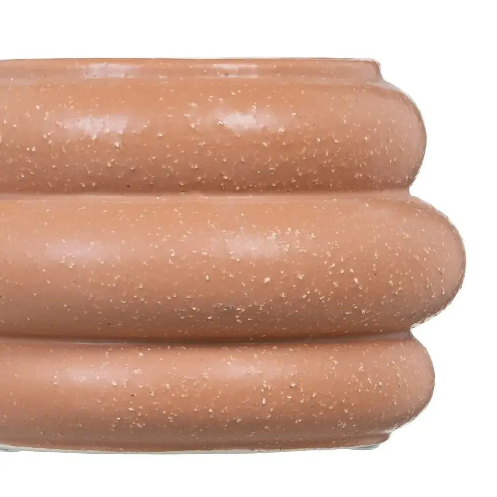 Ceramic orange vase by SKAY with a smooth finish and elegant shape, perfect for home decor.