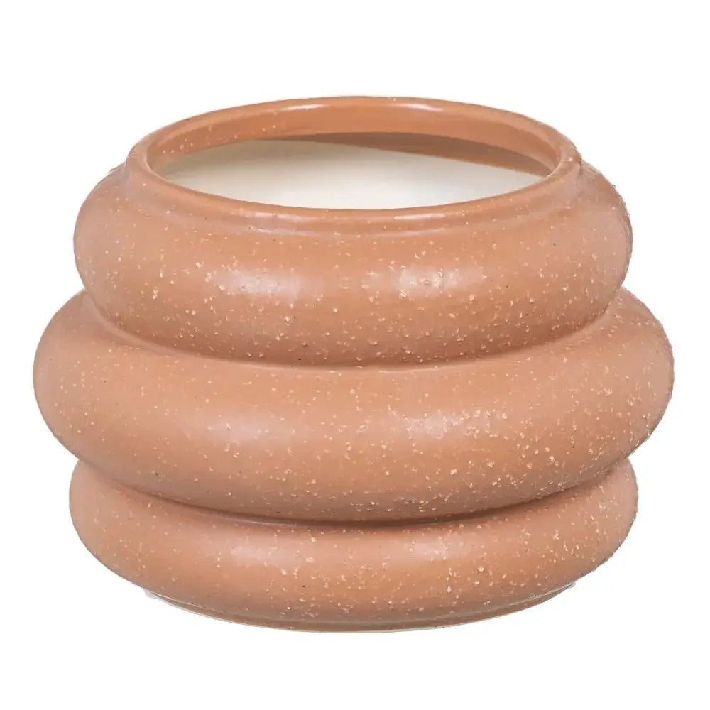 Ceramic orange vase by SKAY, showcasing a smooth, vibrant finish and elegant shape, perfect for floral arrangements.