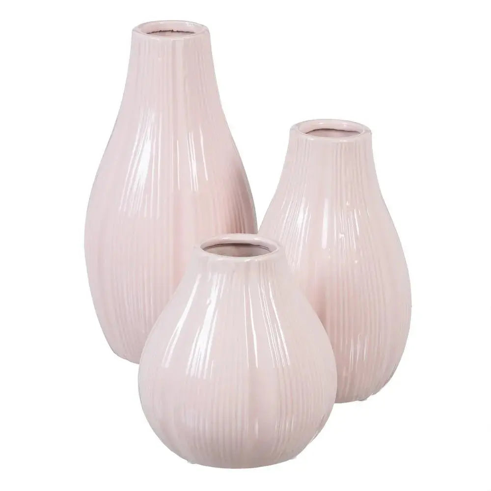 Ceramic pink vase by SKAY with a smooth finish and elegant shape, perfect for floral arrangements or as a decorative piece.
