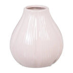 Ceramic pink vase by SKAY showcasing a smooth finish and elegant design, perfect for floral arrangements.