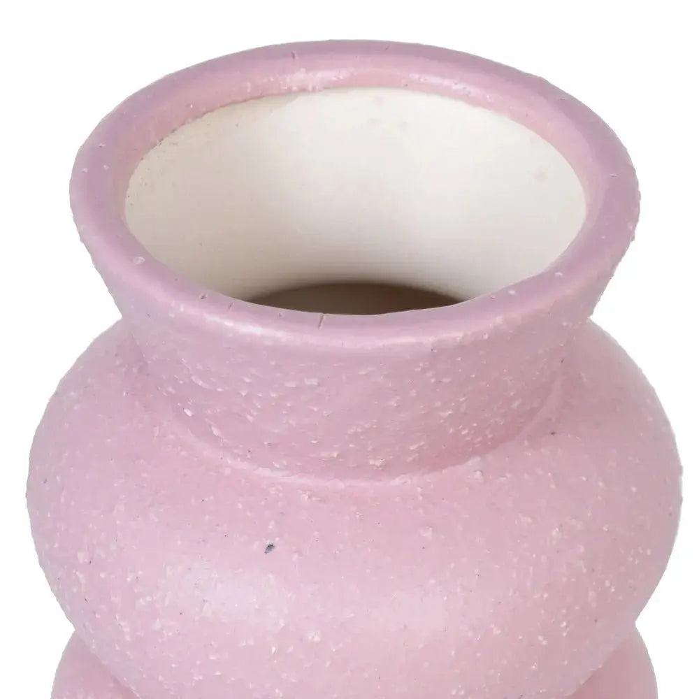 Ceramic pink vase by SKAY, showcasing a smooth finish and elegant design, perfect for floral arrangements.