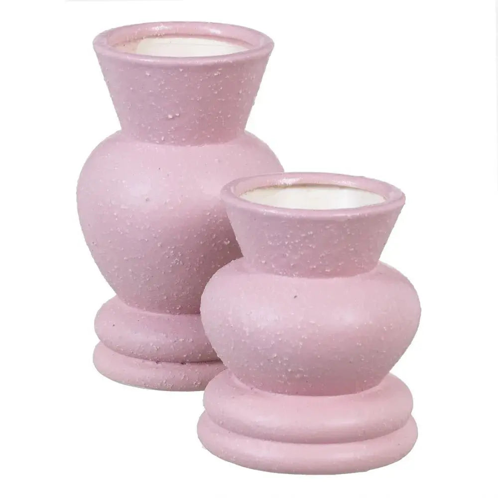 Ceramic pink vase by SKAY, featuring a smooth finish and elegant design, ideal for floral arrangements or decor.