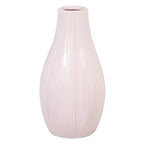Ceramic pink vase from SKAY, showcasing a smooth finish and elegant design, perfect for floral arrangements.