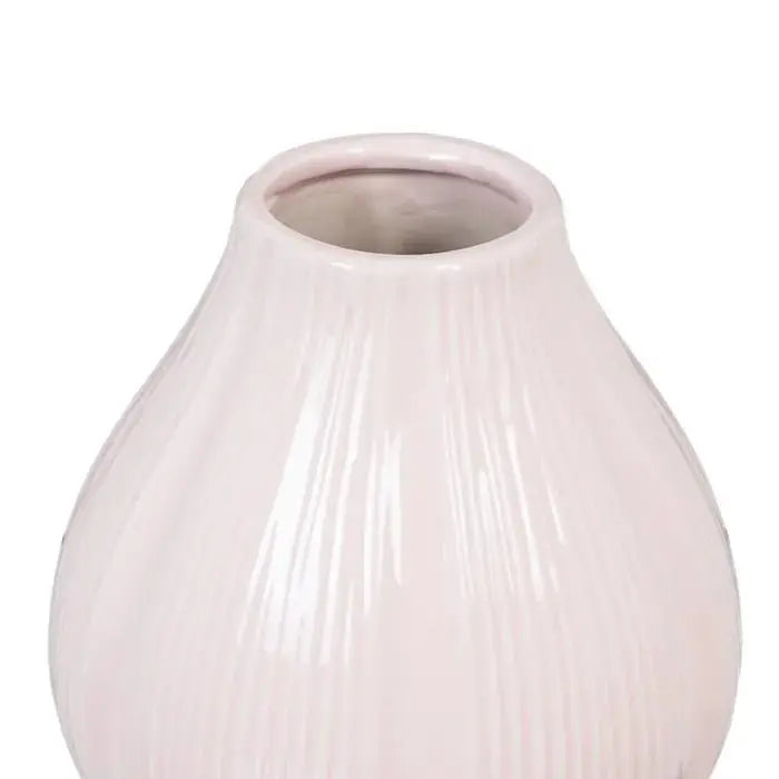 Ceramic pink vase by SKAY, featuring a smooth finish and elegant design, perfect for floral arrangements.