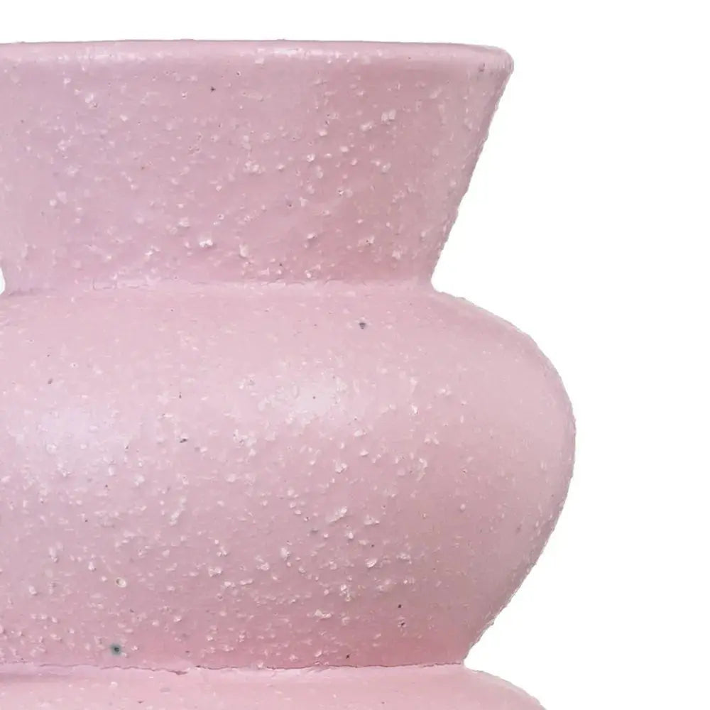 Ceramic pink vase by SKAY with a smooth finish and elegant shape, perfect for floral arrangements or home decor.