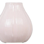 Ceramic pink vase by SKAY, featuring a smooth finish and elegant design, perfect for floral arrangements.