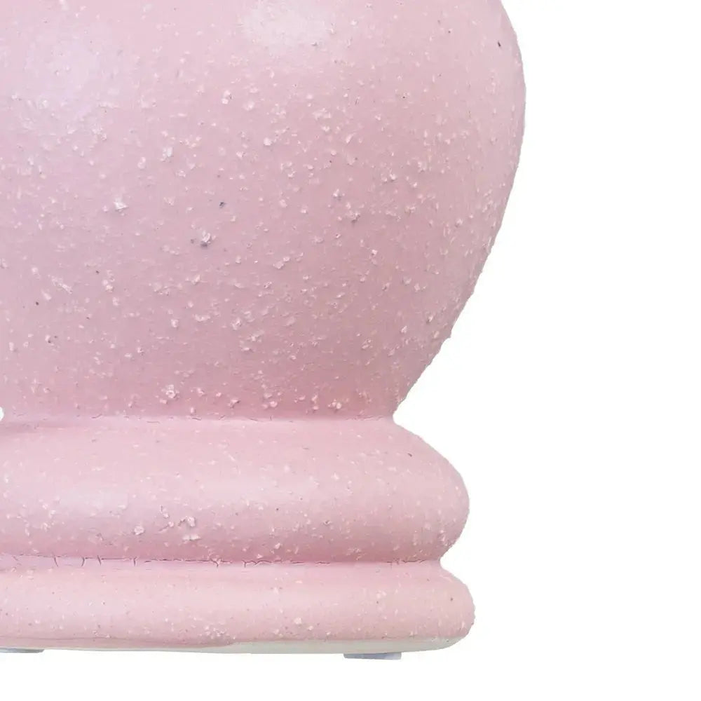 Ceramic pink vase by SKAY, featuring a smooth finish and elegant design, perfect for floral arrangements.