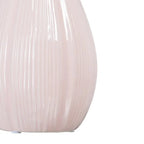 Ceramic pink vase by SKAY, showcasing a smooth finish and elegant design, perfect for floral arrangements.