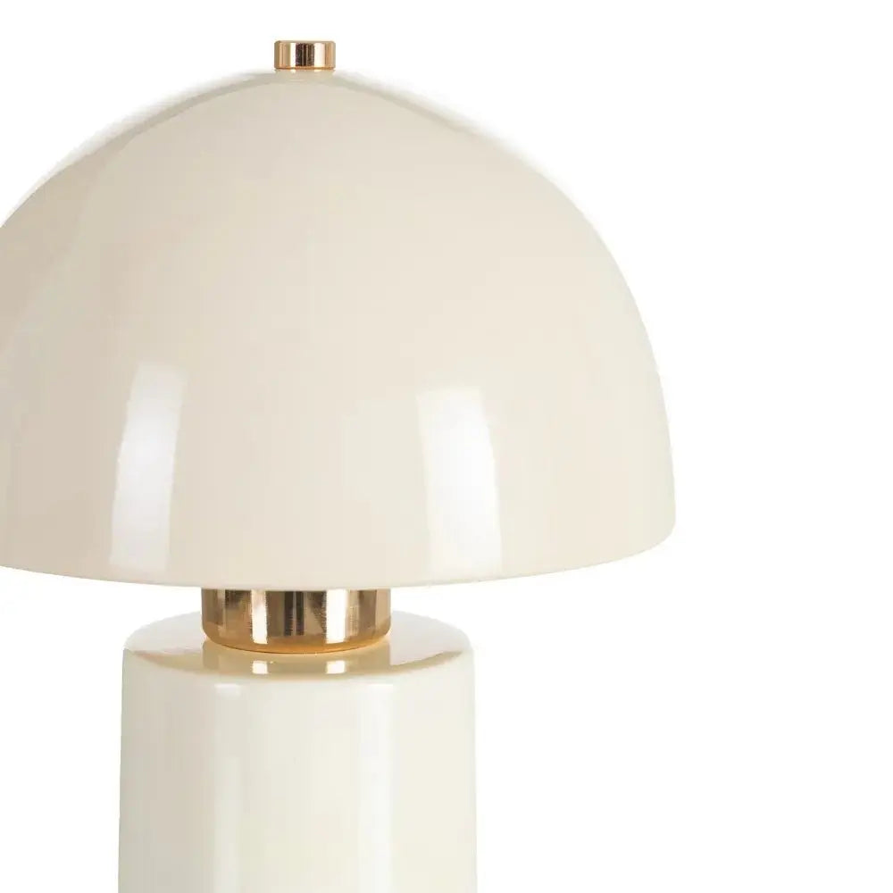 Ceramic cream table lamp by SKAY, featuring a sleek design and soft light suitable for any room decor.
