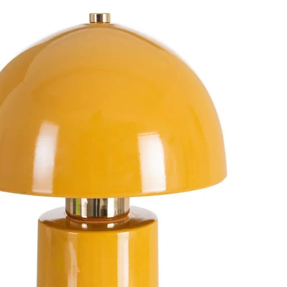 Ceramic mustard yellow table lamp by SKAY, featuring a sleek design and warm glow for any room decor.