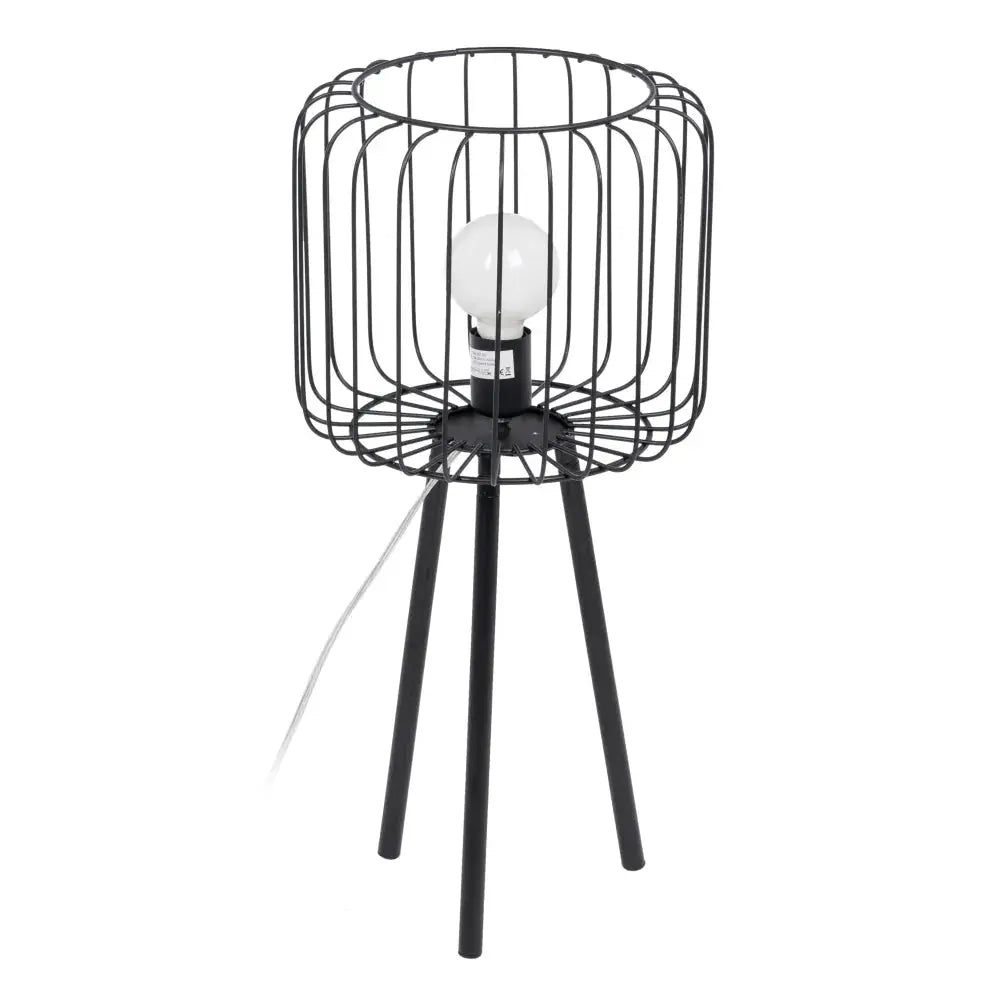 Black metal table lamp by SKAY with a sleek design, illuminating a cozy tabletop setting.