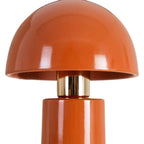 Ceramic terracotta table lamp by SKAY featuring a warm, earthy design and soft illumination.