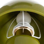 Ceramic green table lamp by SKAY, featuring a sleek design and soft light, perfect for home decor.