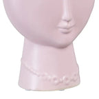 Ceramic malva face planter by Skay, featuring a unique design and vibrant color, perfect for indoor plants.