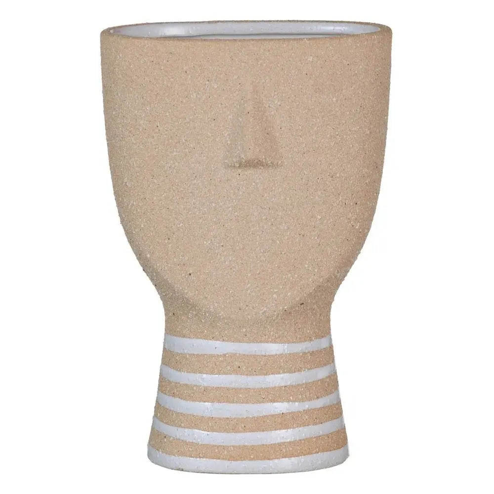 Natural ceramic planter by SKAY, featuring a smooth finish and earthy tones, perfect for indoor or outdoor plants.