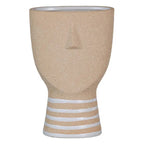 Natural ceramic planter by SKAY, featuring a smooth finish and earthy tones, perfect for indoor or outdoor plants.