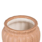 Ceramic salmon planter by SKAY, featuring a smooth finish and a modern design for indoor or outdoor use.
