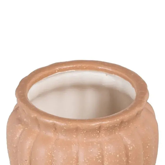 Ceramic salmon planter by SKAY, featuring a smooth finish and a modern design for indoor or outdoor use.