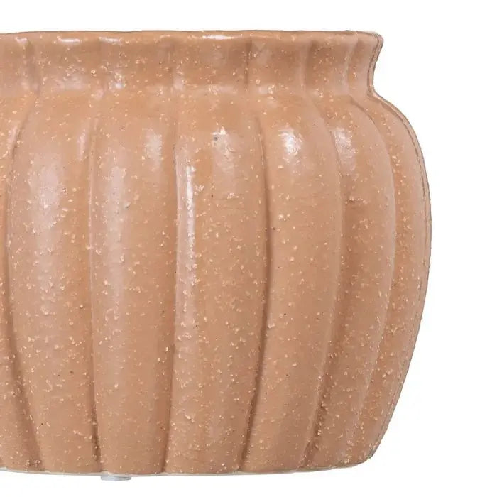 Ceramic salmon planter by SKAY, featuring a smooth finish and a stylish design, perfect for indoor or outdoor plants.