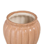 Ceramic salmon planter by SKAY, featuring a smooth finish and vibrant color, perfect for indoor plants.