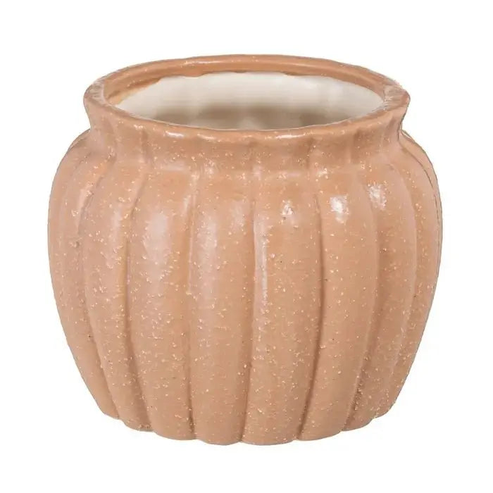 Ceramic salmon-colored planter by SKAY, featuring a smooth finish and modern design, ideal for indoor plants.