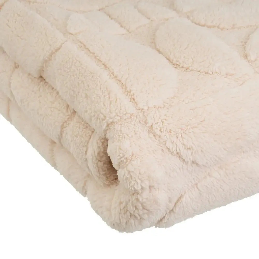 Soft SKAY jacquard blanket featuring intricate patterns, perfect for cozying up at home or adding a stylish touch to decor.