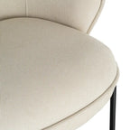 Beige SKAY chair with a fabric seat and metal frame, showcasing modern design and comfortable seating.