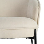 Beige SKAY armchair with a woven fabric seat and metal frame, showcasing modern design and comfortable seating.