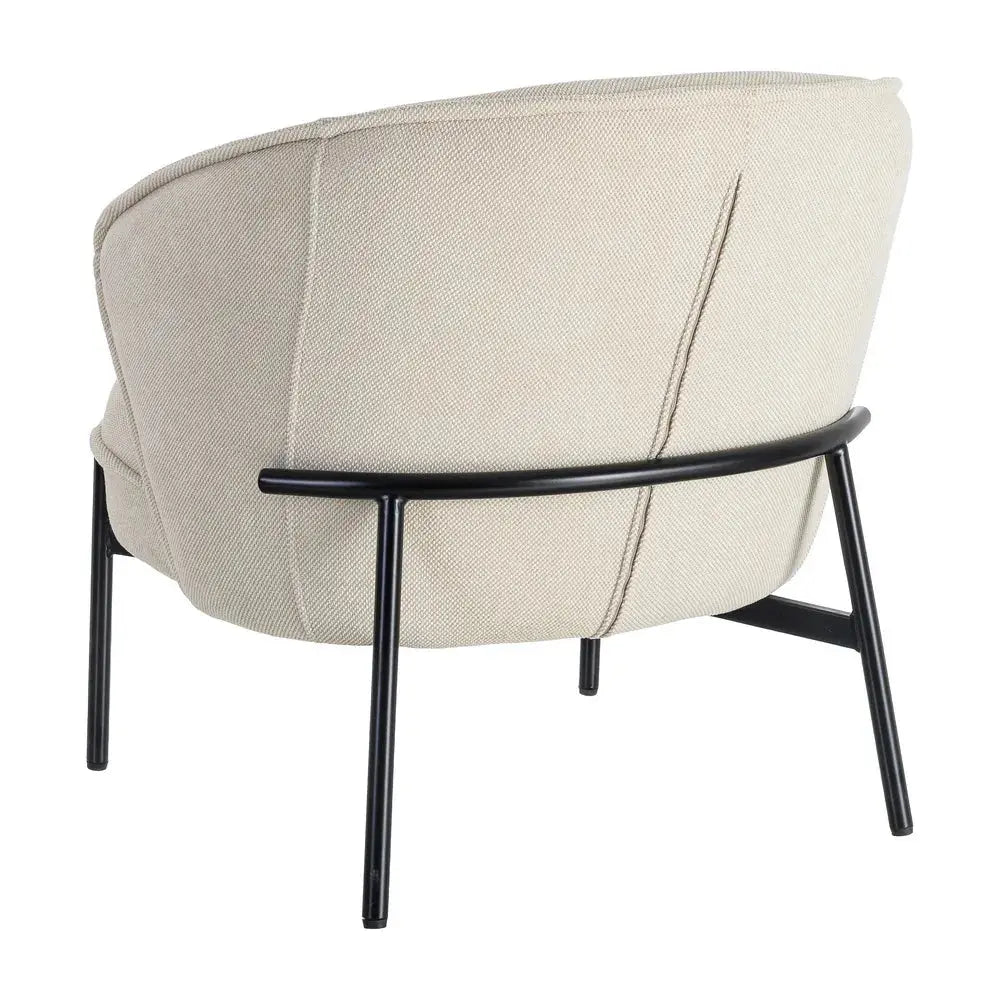 Beige fabric and metal armchair by SKAY, showcasing a modern design and comfortable seating.
